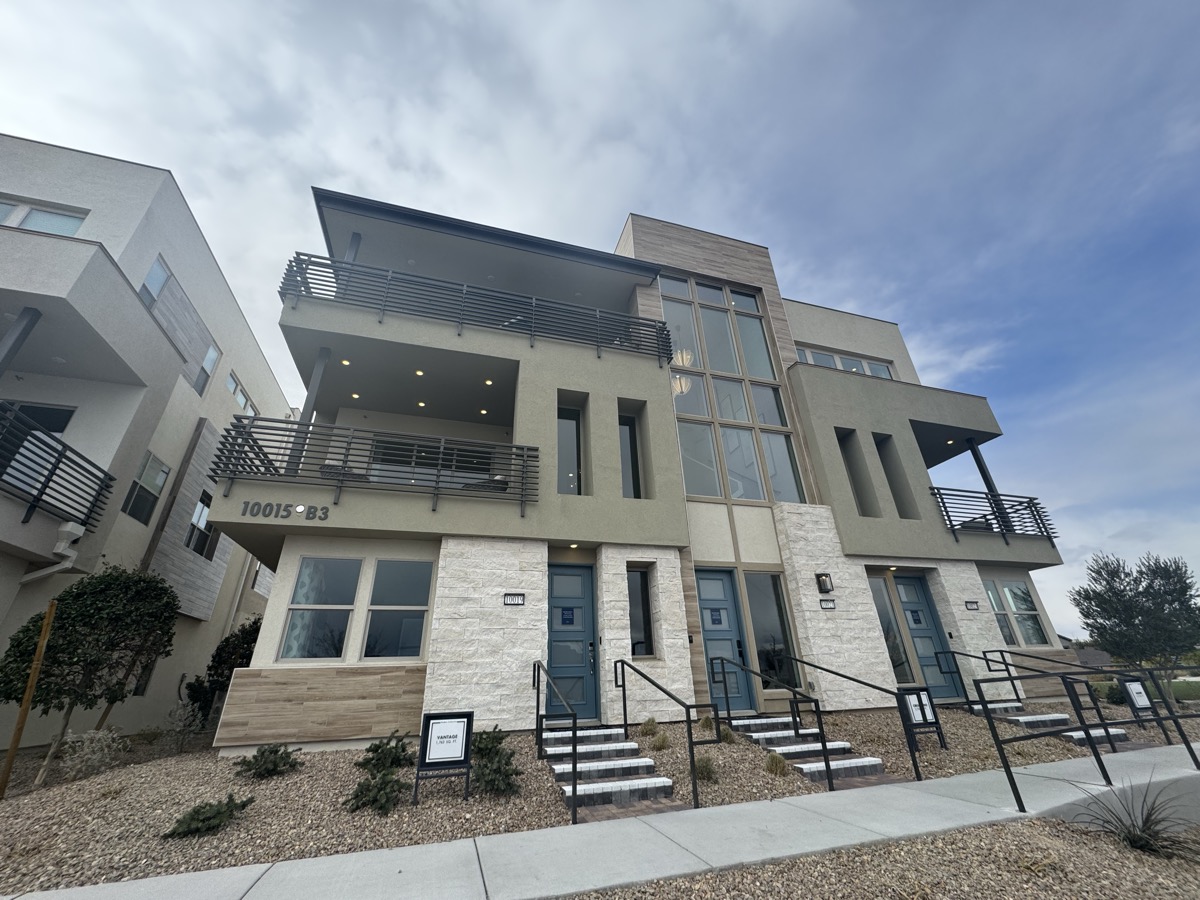 Three-story modern townhomes in North Las Vegas with professionally cleaned windows and glass balconies